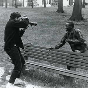 Steve Carver shooting footage of Billy Towns near a bench in Forest Park, St. Louis, during production of "More Than One Thing"