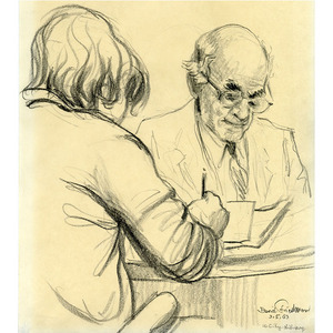 Older Man and Teenage Boy Reading at Table