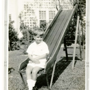James Merrill as a boy on slide<br />
